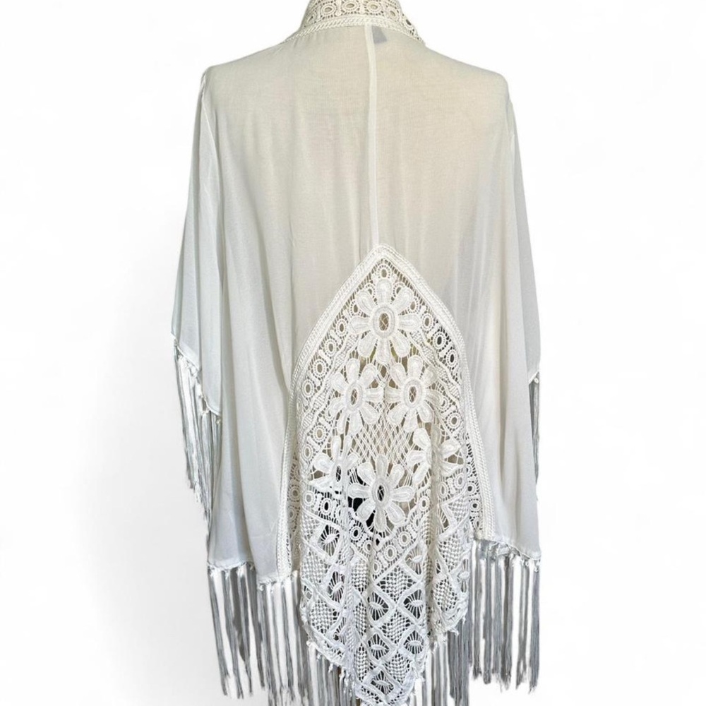 White Torrid crochet fringe kimono